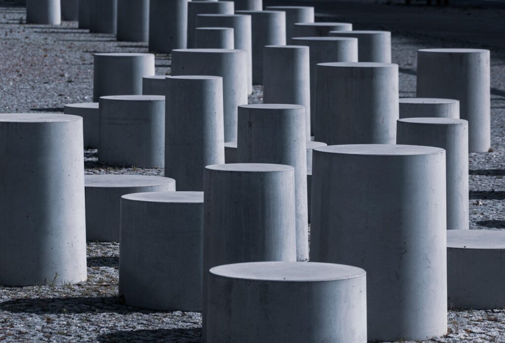 Concrete security bollards protecting a site perimeter