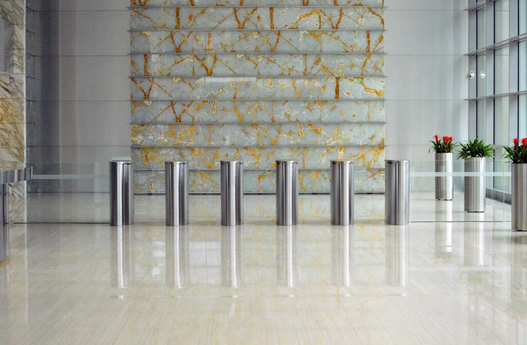 Indoor security bollards in a commercial building entrance