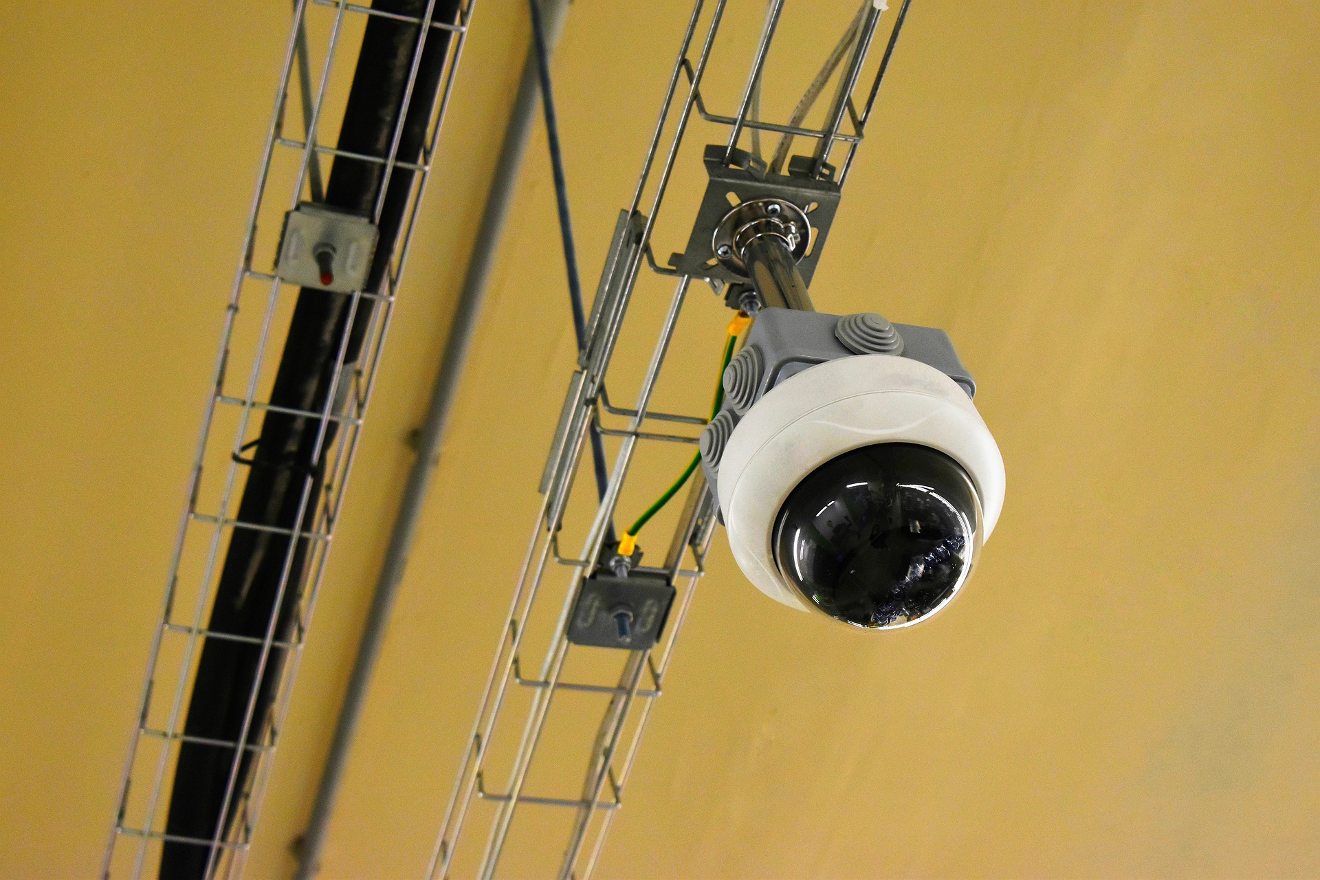 Security camera mounted on a building
